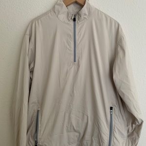 Adidasgolf beige half-zip windbreaker size M